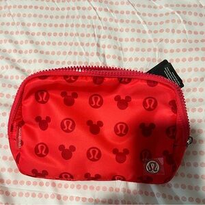 Lululemon Disney belt bag. Hot pink